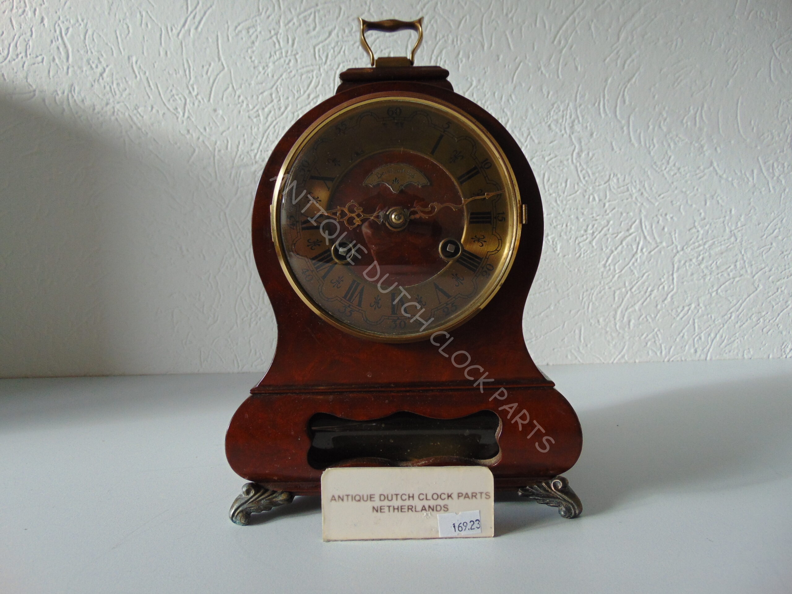 WARMINK TABLE CABINET CLOCK WITH DOUBLE BELL AND OVERHAULED CLOCKWORK
