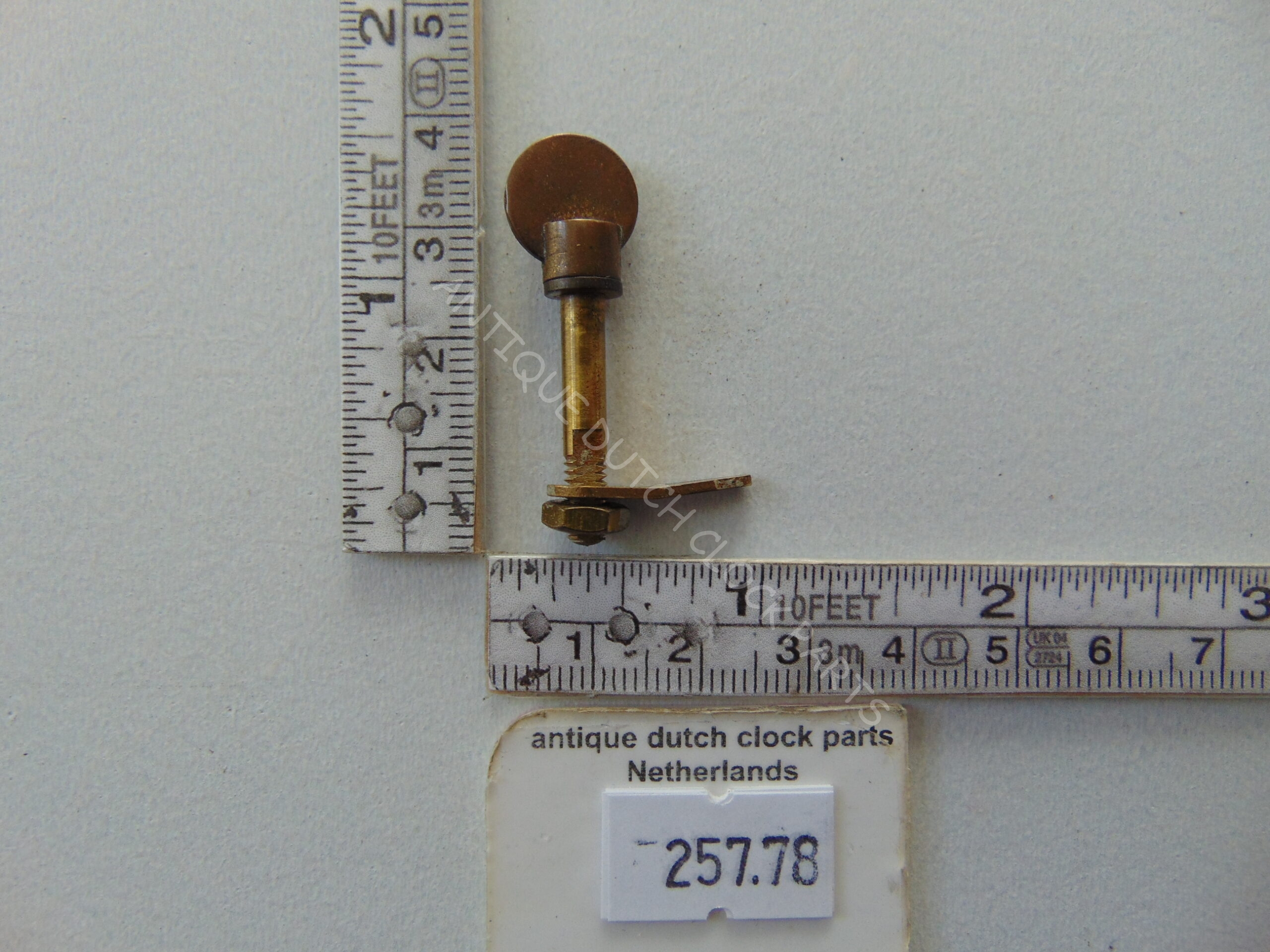 BRASS LATCH FOR A FRENCH ELECTRIC BULLE CLOCK