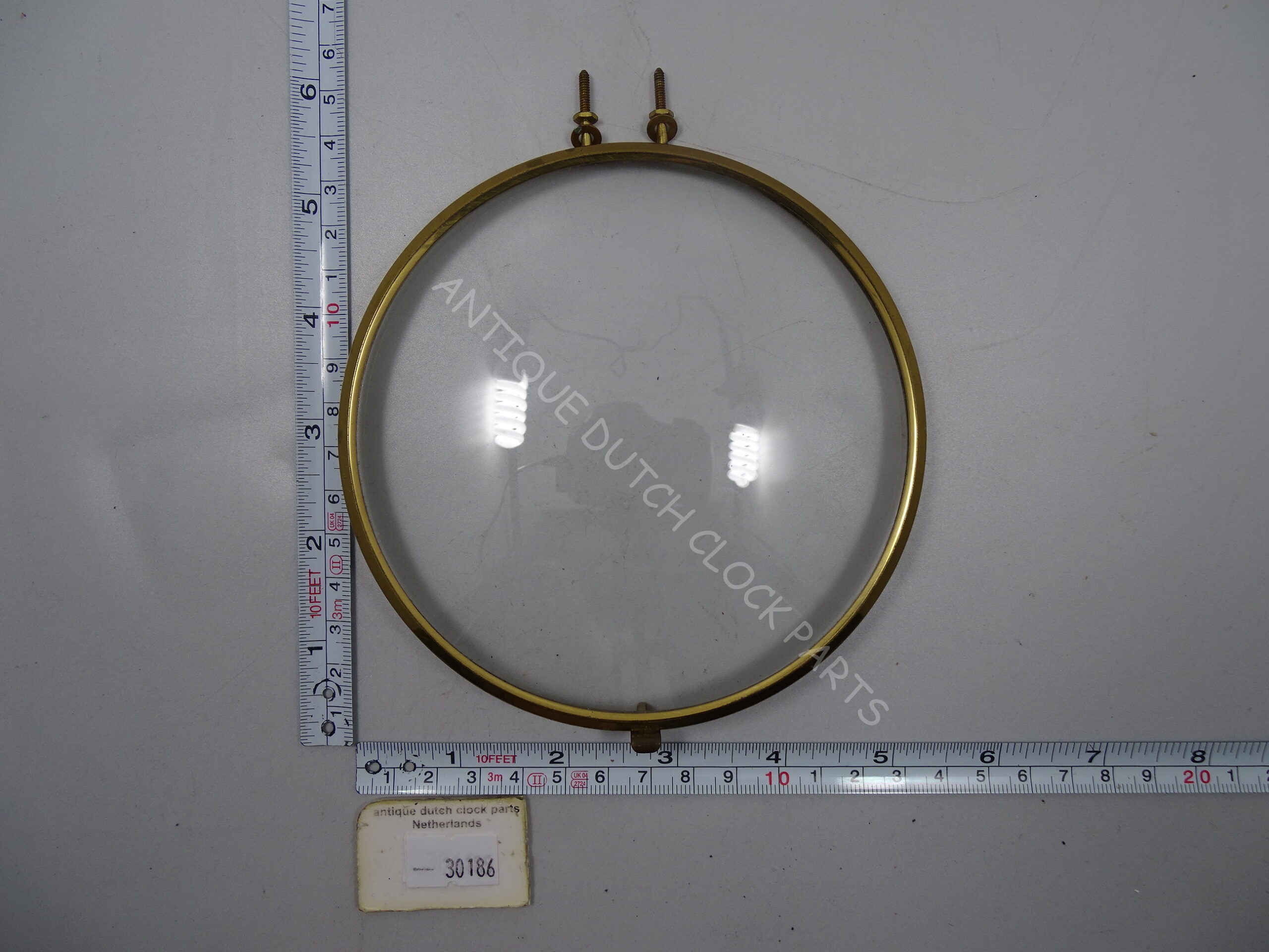 ROUND CONCAVE GLASS IN BRASS DOOR FRAME FOR A MANTEL CLOCK 5 1/8″ OR 13 CM WIDE